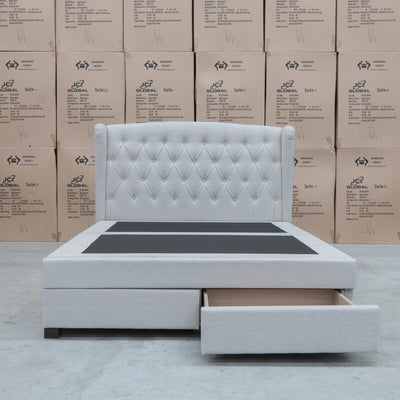 The Amelia King Fabric Gas Lift Storage Drawer Bed - Oat White - Available After 10th October available to purchase from Warehouse Furniture Clearance at our next sale event.