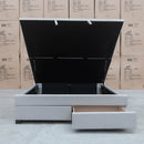 The Amelia Queen Fabric Gas Lift Storage Drawer Bed - Oat White - Available After 10th October available to purchase from Warehouse Furniture Clearance at our next sale event.