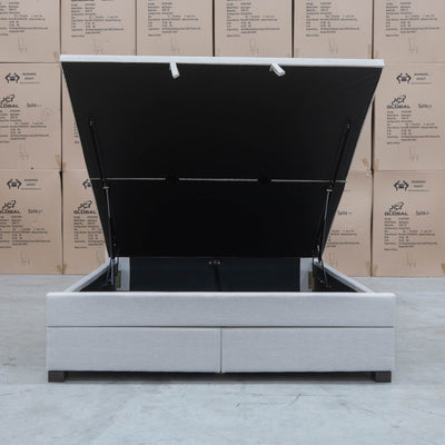 The Amelia Queen Fabric Gas Lift Storage Drawer Bed - Oat White - Available After 10th October available to purchase from Warehouse Furniture Clearance at our next sale event.