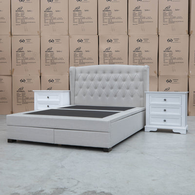 The Amelia King Fabric Gas Lift Storage Drawer Bed - Oat White - Available After 10th October available to purchase from Warehouse Furniture Clearance at our next sale event.