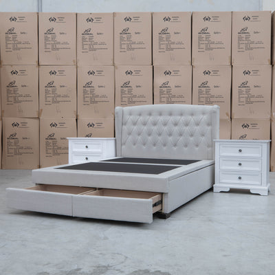 The Amelia King Fabric Gas Lift Storage Drawer Bed - Oat White - Available After 10th October available to purchase from Warehouse Furniture Clearance at our next sale event.