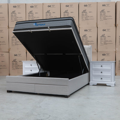 The Amelia King Fabric Gas Lift Storage Drawer Bed - Oat White - Available After 10th October available to purchase from Warehouse Furniture Clearance at our next sale event.