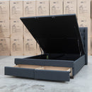 The Amie Queen Fabric Gas Lift & Storage Drawer Bed – Charcoal available to purchase from Warehouse Furniture Clearance at our next sale event.