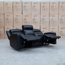 The Gers Dual Electric Three Seat Leather Recliner Lounge - Black available to purchase from Warehouse Furniture Clearance at our next sale event.