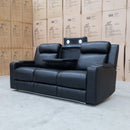 The Gers Dual Electric Three Seat Leather Recliner Lounge - Black available to purchase from Warehouse Furniture Clearance at our next sale event.