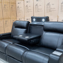 The Gers Dual Electric Three Seat Leather Recliner Lounge - Black available to purchase from Warehouse Furniture Clearance at our next sale event.