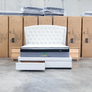 The Grace King Fabric Storage Bed - Cream available to purchase from Warehouse Furniture Clearance at our next sale event.