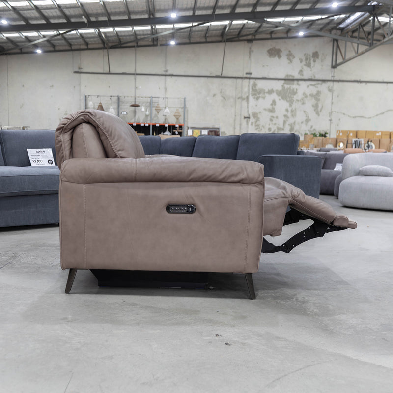 The RS-12667-PR Oversized single dual motor leather recliner - Biscuit - Floor Stock available to purchase from Warehouse Furniture Clearance at our next sale event.