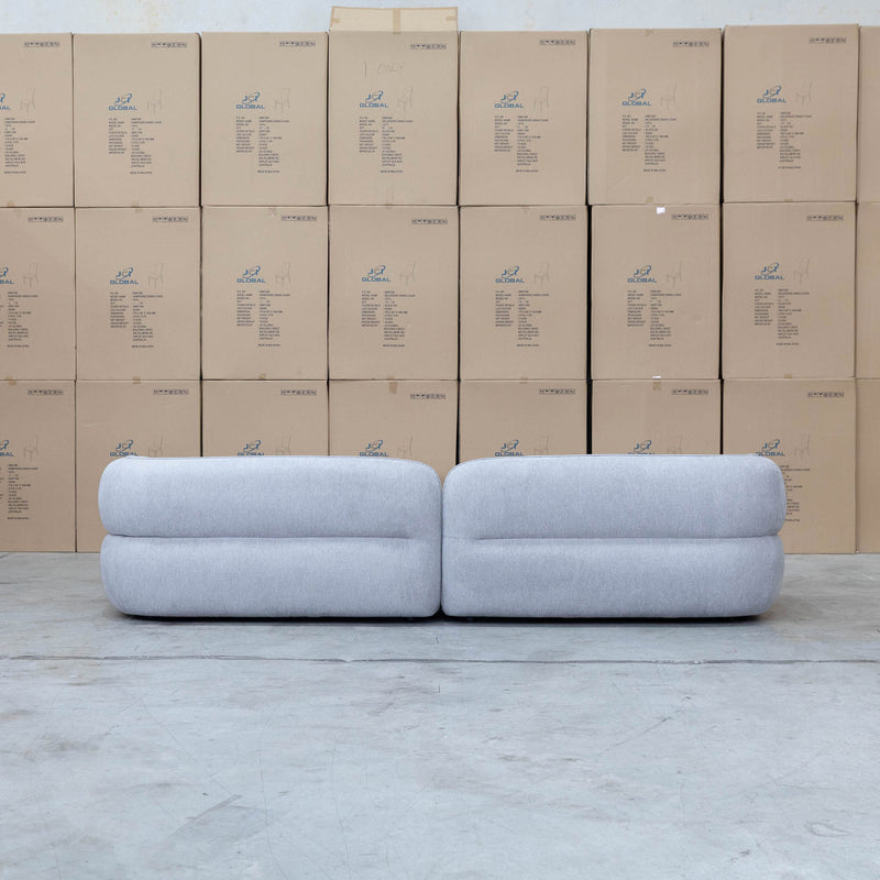 The Harper Curved Fabric Four Seat Sofa - Pewter available to purchase from Warehouse Furniture Clearance at our next sale event.