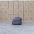 The Harper Curved Fabric Four Seat Sofa - Charcoal available to purchase from Warehouse Furniture Clearance at our next sale event.