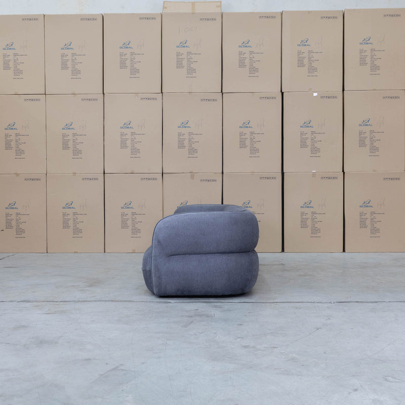 The Harper Curved Fabric Four Seat Sofa - Charcoal available to purchase from Warehouse Furniture Clearance at our next sale event.