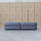 The Harper Curved Fabric Four Seat Sofa - Charcoal available to purchase from Warehouse Furniture Clearance at our next sale event.