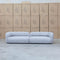 The Harper Curved Fabric Four Seat Sofa - Pewter available to purchase from Warehouse Furniture Clearance at our next sale event.