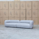 The Harper Curved Fabric Four Seat Sofa - Pewter available to purchase from Warehouse Furniture Clearance at our next sale event.