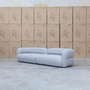 The Harper Curved Fabric Four Seat Sofa - Pewter available to purchase from Warehouse Furniture Clearance at our next sale event.