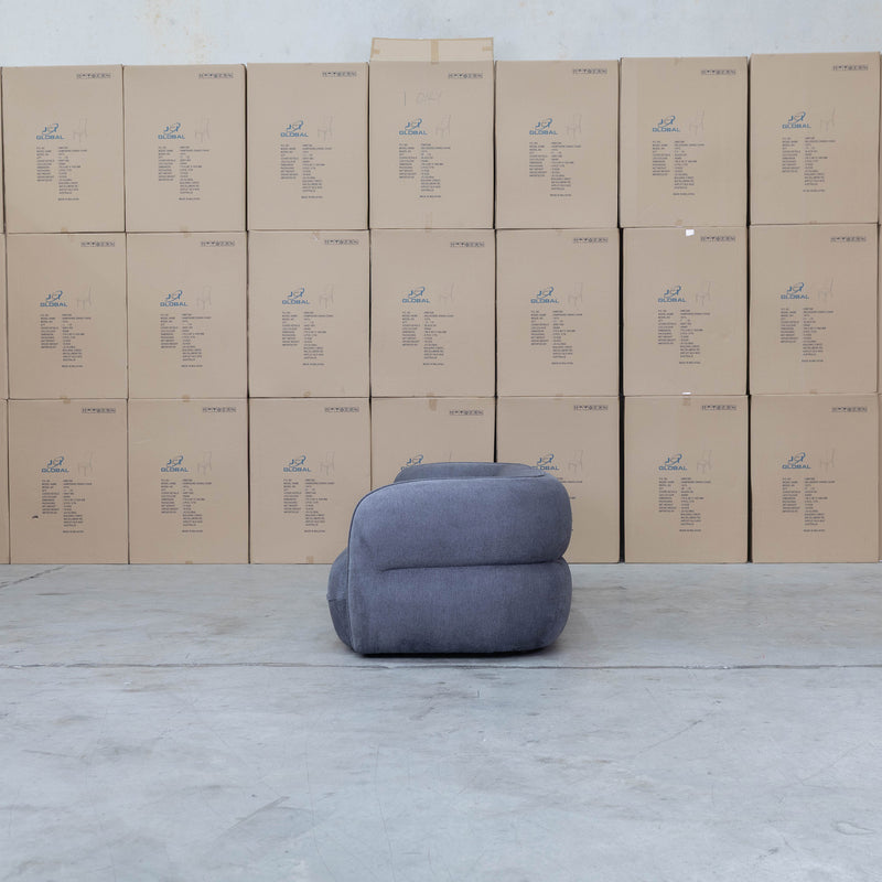 The Harper Curved Fabric Four Seat Sofa - Charcoal available to purchase from Warehouse Furniture Clearance at our next sale event.