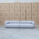 The Harper Curved Fabric Four Seat Sofa - Pewter available to purchase from Warehouse Furniture Clearance at our next sale event.