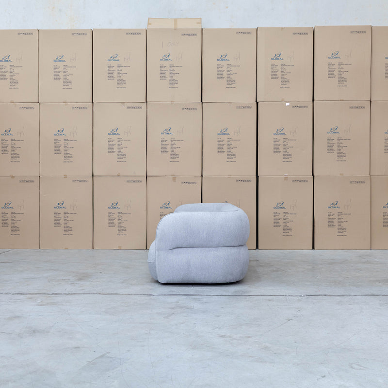 The Harper Curved Fabric Four Seat Sofa - Pewter available to purchase from Warehouse Furniture Clearance at our next sale event.
