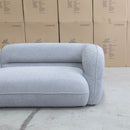 The Harper Curved Fabric Four Seat Sofa - Pewter available to purchase from Warehouse Furniture Clearance at our next sale event.