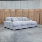 The Kalena Oversized Plush Feather & Foam Double Chaise Lounge - Silver available to purchase from Warehouse Furniture Clearance at our next sale event.