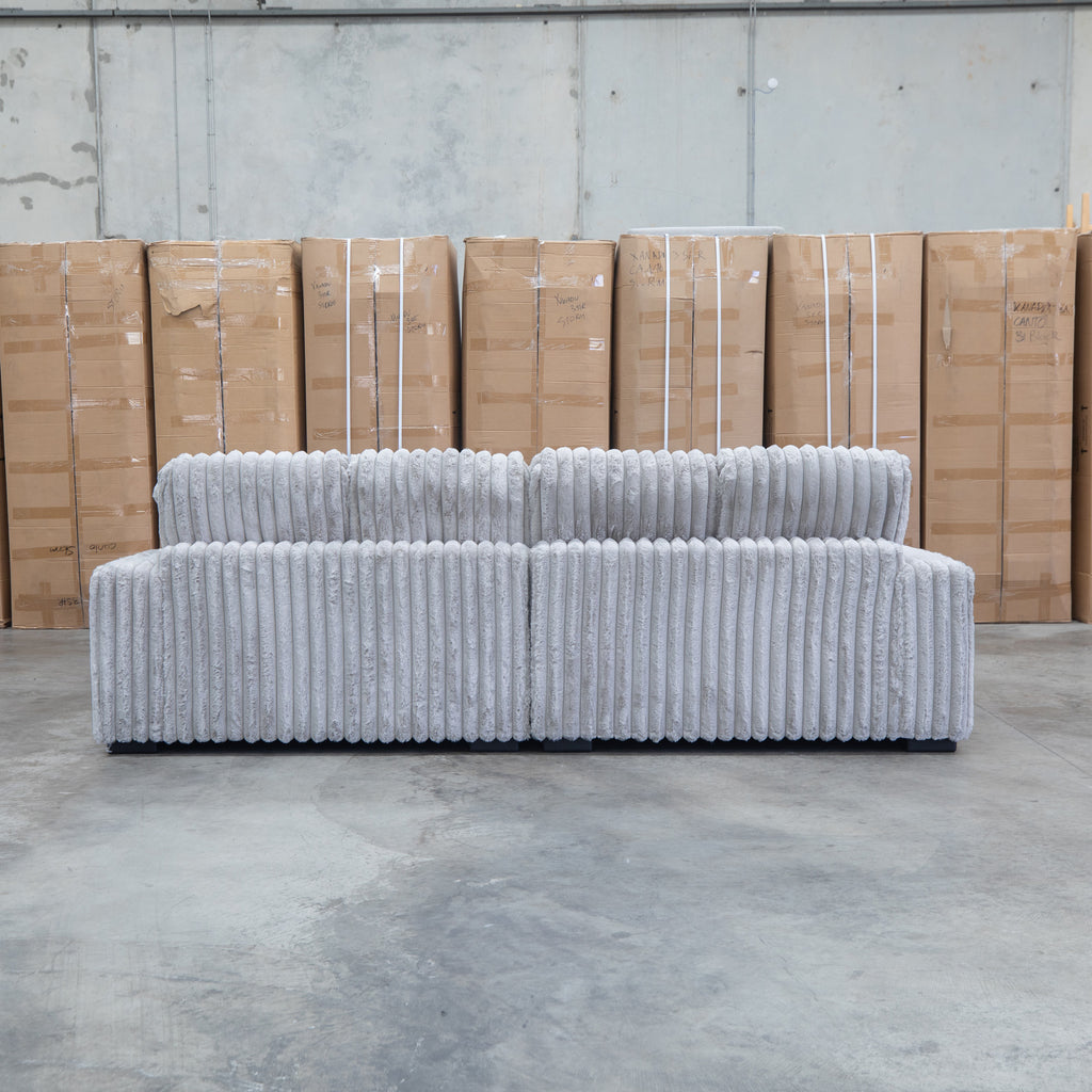 The Kalena Oversized Plush Feather & Foam Double Chaise Lounge - Silver available to purchase from Warehouse Furniture Clearance at our next sale event.