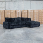 The Kalena Oversized Plush Feather & Foam RHF Chaise Lounge - Black available to purchase from Warehouse Furniture Clearance at our next sale event.