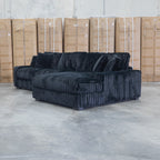 The Kalena Oversized Plush Feather & Foam RHF Chaise Lounge - Black available to purchase from Warehouse Furniture Clearance at our next sale event.