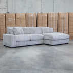 The Kalena Oversized Plush Feather & Foam RHF Chaise Lounge - Silver available to purchase from Warehouse Furniture Clearance at our next sale event.