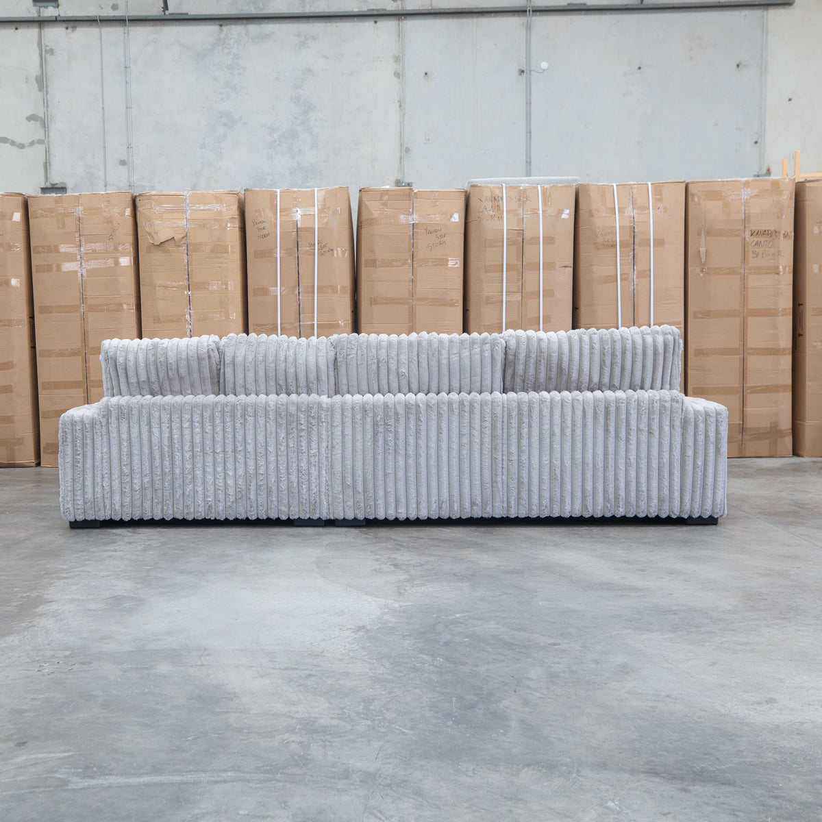 The Kalena Oversized Plush Feather & Foam RHF Chaise Lounge - Silver available to purchase from Warehouse Furniture Clearance at our next sale event.