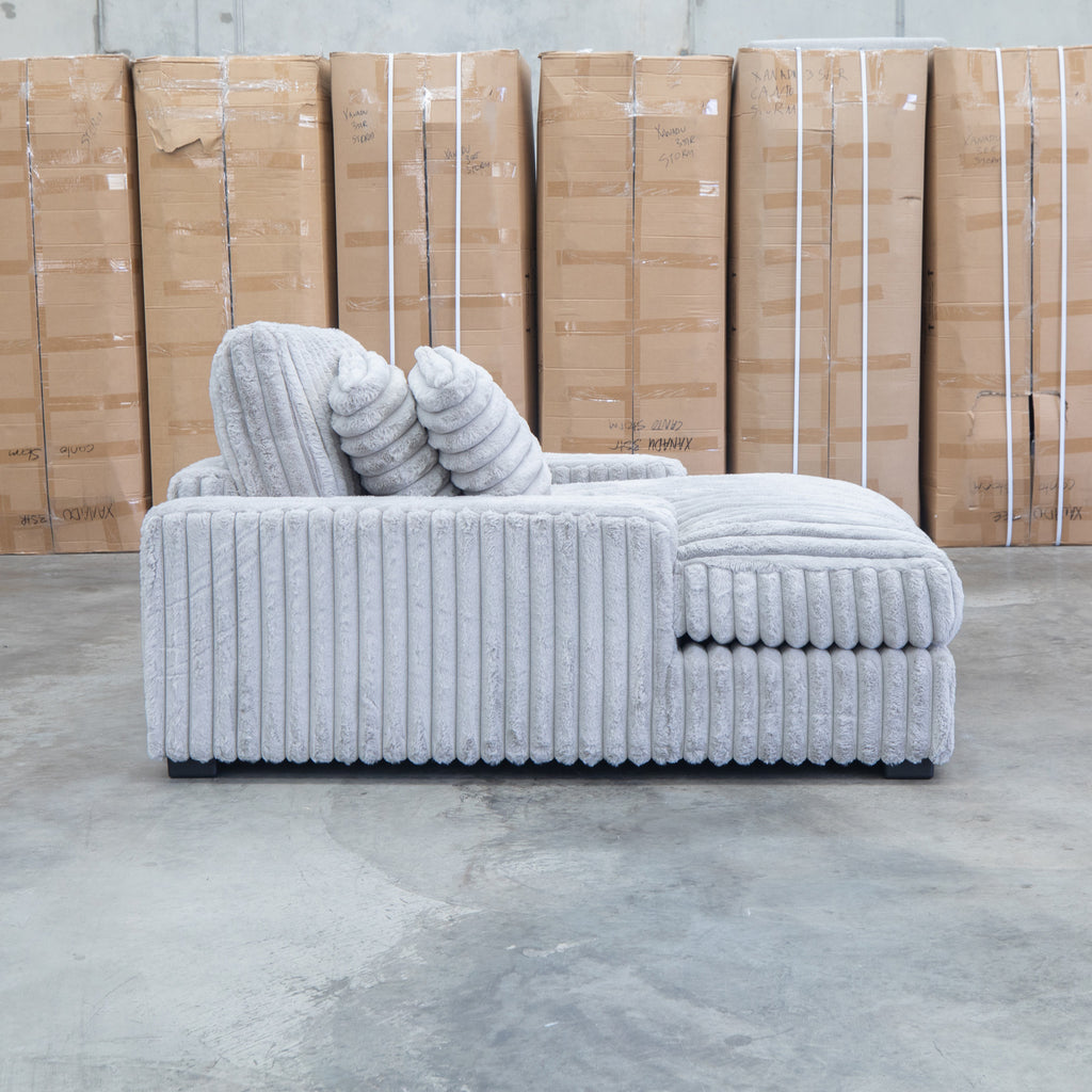 The Kalena Oversized Plush Feather & Foam Single Chaise - Silver available to purchase from Warehouse Furniture Clearance at our next sale event.