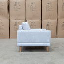 The Khloe Fabric Armchair - Whisper available to purchase from Warehouse Furniture Clearance at our next sale event.