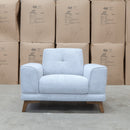 The Khloe Fabric Armchair - Whisper available to purchase from Warehouse Furniture Clearance at our next sale event.