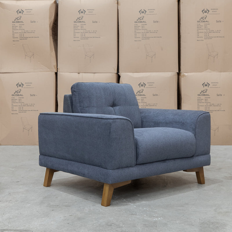 The Khloe Fabric Armchair - Shadow available to purchase from Warehouse Furniture Clearance at our next sale event.