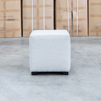 The Laura Boucle Ottoman - Cream available to purchase from Warehouse Furniture Clearance at our next sale event.