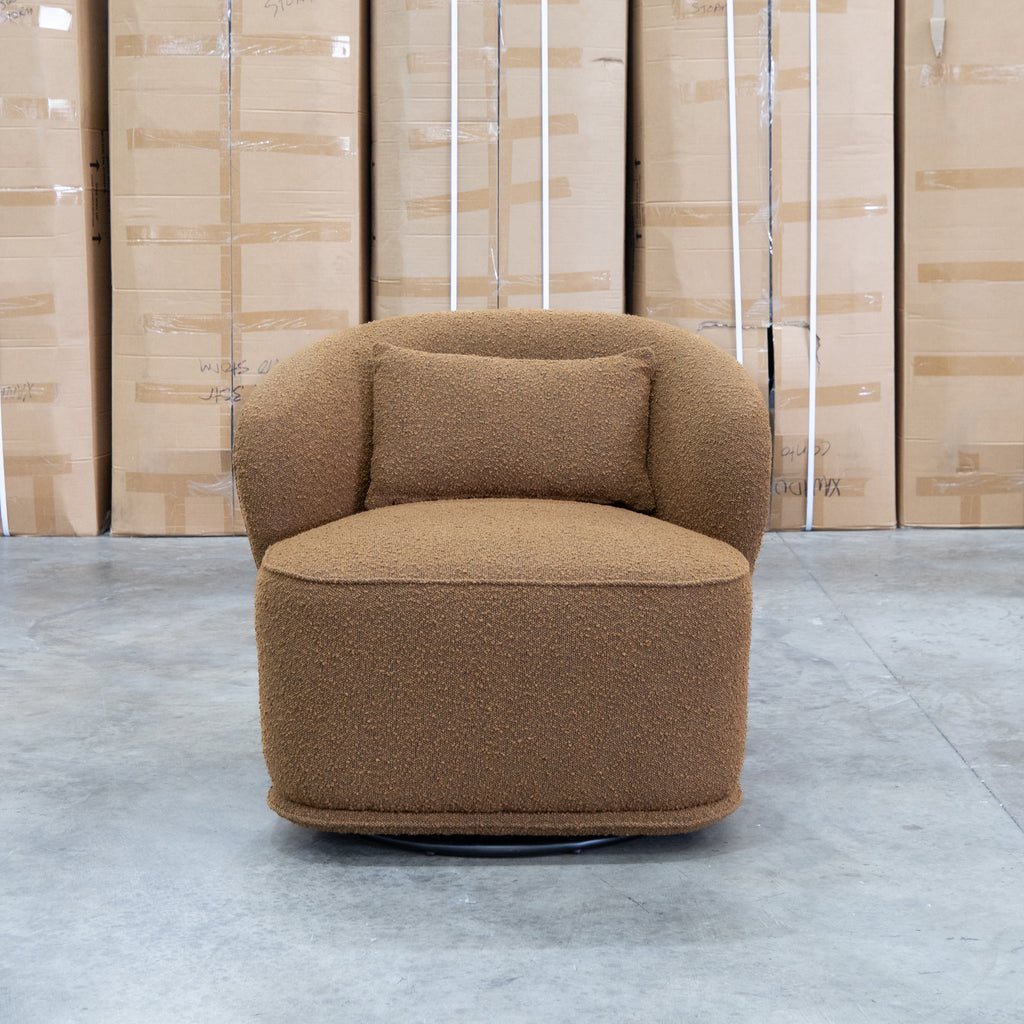 The Laura Boucle Swivel Armchair - Camel available to purchase from Warehouse Furniture Clearance at our next sale event.