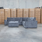 The Layne Modular Corner Lounge with Ottoman - Solo Charcoal available to purchase from Warehouse Furniture Clearance at our next sale event.