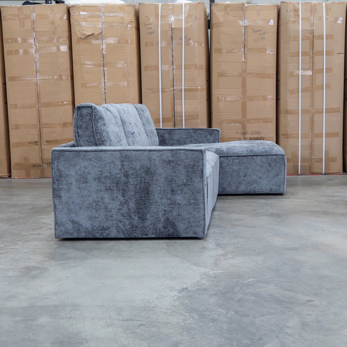 The Layne RHF Chaise Lounge - Solo Charcoal available to purchase from Warehouse Furniture Clearance at our next sale event.