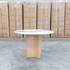 The Lorvani 120cm Round Sintered Stone Dining Table available to purchase from Warehouse Furniture Clearance at our next sale event.