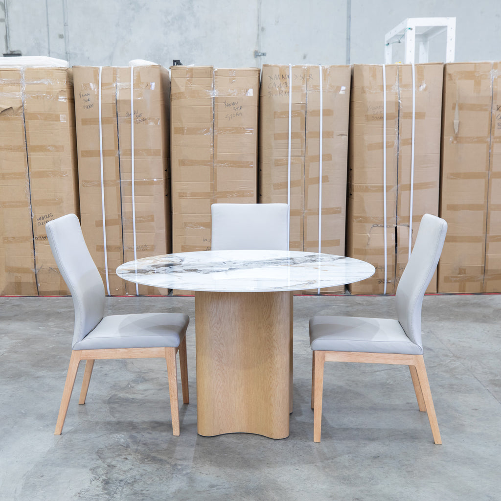The Lorvani 120cm Round Sintered Stone Dining Table available to purchase from Warehouse Furniture Clearance at our next sale event.