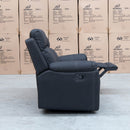 The Bari Three Seater Recliner Lounge - Jet available to purchase from Warehouse Furniture Clearance at our next sale event.