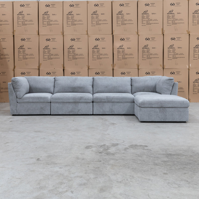 The Alexa Modular Corner Lounge with Ottoman - Light Grey available to purchase from Warehouse Furniture Clearance at our next sale event.
