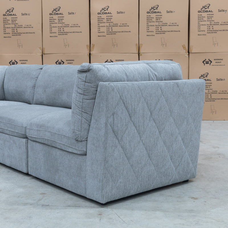 The Alexa Modular Corner Lounge with Ottoman - Light Grey available to purchase from Warehouse Furniture Clearance at our next sale event.