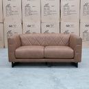 The Santosa Two Seat Fabric Sofa - Tan available to purchase from Warehouse Furniture Clearance at our next sale event.