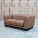 The Santosa Two Seat Fabric Sofa - Tan available to purchase from Warehouse Furniture Clearance at our next sale event.