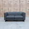 The Santosa Two Seat Fabric Sofa - Charcoal available to purchase from Warehouse Furniture Clearance at our next sale event.