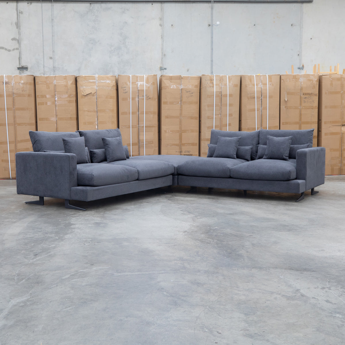 The Melbourne Deep Seat Feather & Foam Modular Corner Lounge - Obsidian available to purchase from Warehouse Furniture Clearance at our next sale event.