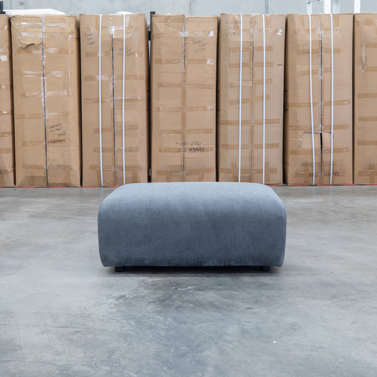 The Tribeca Fabric Ottoman - Charcoal - PRE ORDER Available After 15th November available to purchase from Warehouse Furniture Clearance at our next sale event.