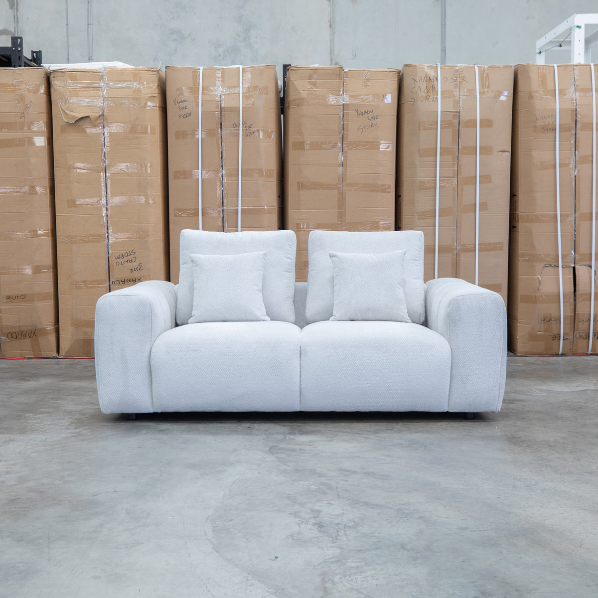 The Tribeca Two Seat Fabric Sofa - Oat - PRE ORDER Available After 15th November available to purchase from Warehouse Furniture Clearance at our next sale event.