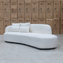 The Santorini Curved Chaise Sofa - Ivory Boucle available to purchase from Warehouse Furniture Clearance at our next sale event.