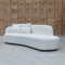The Santorini Curved Chaise Sofa - Ivory Boucle - Available After 30th April available to purchase from Warehouse Furniture Clearance at our next sale event.